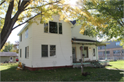 220 N 3RD ST, a Gabled Ell house, built in New Richmond, Wisconsin in 1900.