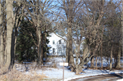 5988 ADAMS RD, a Greek Revival house, built in Fitchburg, Wisconsin in 1868.