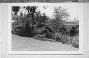 1ST ST, a NA (unknown or not a building) stone arch bridge, built in Merrill, Wisconsin in 1904.