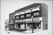 603 - 609 N 3RD ST, a Commercial Vernacular retail building, built in Wausau, Wisconsin in 1913.