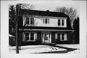 822 MCINDOE ST, a Dutch Colonial Revival house, built in Wausau, Wisconsin in 1924.