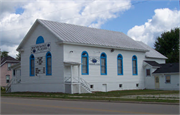 408 PARK AVE, a Greek Revival church, built in Oconto, Wisconsin in 1866.