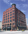 500 N WATER ST, a Romanesque Revival retail building, built in Milwaukee, Wisconsin in 1892.