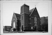114 S K ST, a Early Gothic Revival church, built in Sparta, Wisconsin in 1905.