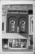 142 N WATER ST, a Italianate retail building, built in Sparta, Wisconsin in 1880.