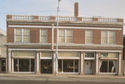 172-176 W WISCONSIN AVE, a Neoclassical/Beaux Arts retail building, built in Kaukauna, Wisconsin in 1928.