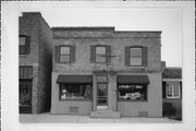 114-116 E GRAND AVE, a Commercial Vernacular retail building, built in Port Washington, Wisconsin in 1910.