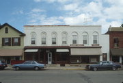 6-12 E HUDSON, a Commercial Vernacular retail building, built in Mazomanie, Wisconsin in 1866.