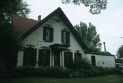 121 W LINCOLN ST, a Early Gothic Revival house, built in Oregon, Wisconsin in 1879.