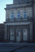 222 MAIN ST (AKA 215 STATE ST), a Romanesque Revival retail building, built in Racine, Wisconsin in 1893.