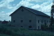 N SIDE OF OLD STAGE RD, .7 M W OF CENTER RD, a Astylistic Utilitarian Building barn, built in Rutland, Wisconsin in 1855.