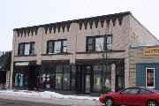 126- 128 W PULASKI ST, a Commercial Vernacular retail building, built in Pulaski, Wisconsin in 1924.