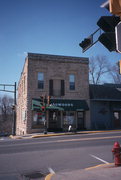 201 CASCADE ST, a Commercial Vernacular tavern/bar, built in Osceola, Wisconsin in 1875.