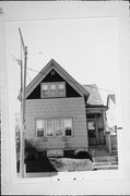 713 E BRADY ST, a Gabled Ell house, built in Milwaukee, Wisconsin in 1885.