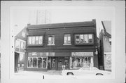 1209-1213 E BRADY ST, a Commercial Vernacular retail building, built in Milwaukee, Wisconsin in 1923.