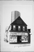 1239-1241 E BRADY ST, a Front Gabled retail building, built in Milwaukee, Wisconsin in 1893.