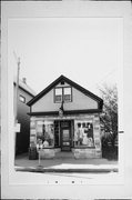 1327 E BRADY ST, a Front Gabled retail building, built in Milwaukee, Wisconsin in 1893.