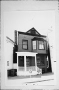 1415-1417 E BRADY ST, a Boomtown retail building, built in Milwaukee, Wisconsin in 1892.