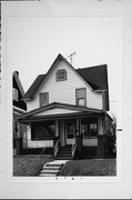 3013 S DELAWARE AVE, a Cross Gabled house, built in Milwaukee, Wisconsin in 1908.