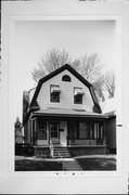 2909 S HERMAN ST, a Dutch Colonial Revival house, built in Milwaukee, Wisconsin in 1906.