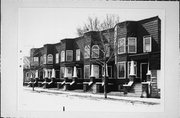 2553-65 S LOGAN AVE, a Queen Anne row house, built in Milwaukee, Wisconsin in 1894.