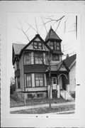 416 W SCOTT ST, a Queen Anne house, built in Milwaukee, Wisconsin in 1890.