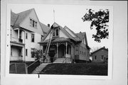 929 W SCOTT ST, a Queen Anne house, built in Milwaukee, Wisconsin in 1875.