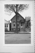 1223 W SCOTT ST, a Queen Anne house, built in Milwaukee, Wisconsin in 1903.