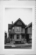 1421-23 W SCOTT ST, a Colonial Revival/Georgian Revival duplex, built in Milwaukee, Wisconsin in 1896.