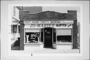 1538 N VAN BUREN, a Arts and Crafts retail building, built in Milwaukee, Wisconsin in 1922.