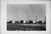BETWEEN THE WASHINGTON SLIP & GREENFIELD SLIP & CHICAGO & NORTHWESTERN TRACKS, a NA (unknown or not a building) storage tank, built in Milwaukee, Wisconsin in 1950.