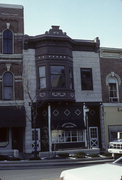 13 N MAIN ST, a Queen Anne retail building, built in Janesville, Wisconsin in 1900.