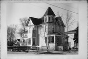 309 CORNELIA ST, a Queen Anne house, built in Janesville, Wisconsin in 1893.