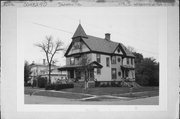 119 S WISCONSIN ST, a Queen Anne house, built in Janesville, Wisconsin in 1892.