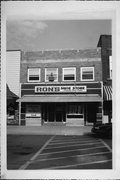 126 S MAIN ST, a Commercial Vernacular retail building, built in Shawano, Wisconsin in 1933.