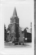 848 E MAIN ST, a Late Gothic Revival church, built in Stoughton, Wisconsin in 1875.