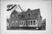 220 N 3RD ST, a Gabled Ell house, built in New Richmond, Wisconsin in 1900.