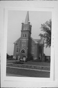 129 S PETERSON AVE, a Late Gothic Revival church, built in Blair, Wisconsin in 1907.