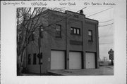 1511 BARTON AVE, a Commercial Vernacular fire house, built in West Bend, Wisconsin in 1921.