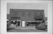 508 Hickory St, a Commercial Vernacular automobile showroom, built in West Bend, Wisconsin in 1927.
