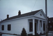 202 E UNION ST, a Greek Revival small office building, built in Waupaca, Wisconsin in 1853.