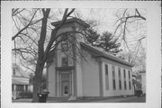 321 S DIVISION ST, a Greek Revival church, built in Waupaca, Wisconsin in 1865.