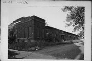 101 S MAPLE, a Twentieth Century Commercial warehouse, built in Marshfield, Wisconsin in 1890.