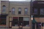 216 W MILWAUKEE ST, a Commercial Vernacular retail building, built in Janesville, Wisconsin in 1878.