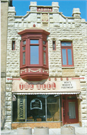 115 N ADAMS ST, a Commercial Vernacular bakery, built in Green Bay, Wisconsin in 1894.