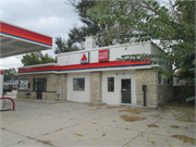 603 W Main St, a Astylistic Utilitarian Building gas station/service station, built in Stoughton, Wisconsin in 1939.