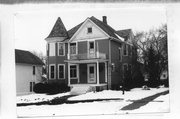224 N MADISON ST, a Queen Anne house, built in Stoughton, Wisconsin in 1902.