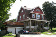 1927 ILLINOIS AVE, a Dutch Colonial Revival house, built in New Holstein, Wisconsin in 1910.