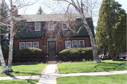 4413 N Prospect Ave, a Dutch Colonial Revival house, built in Shorewood, Wisconsin in 1918.