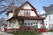 51 6TH ST, a Dutch Colonial Revival house, built in Fond du Lac, Wisconsin in 1905.